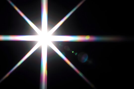 Lens flare glow light effect on black. image of rays light effects, overlays or flare isolated on black background for design. lens flare light over black background