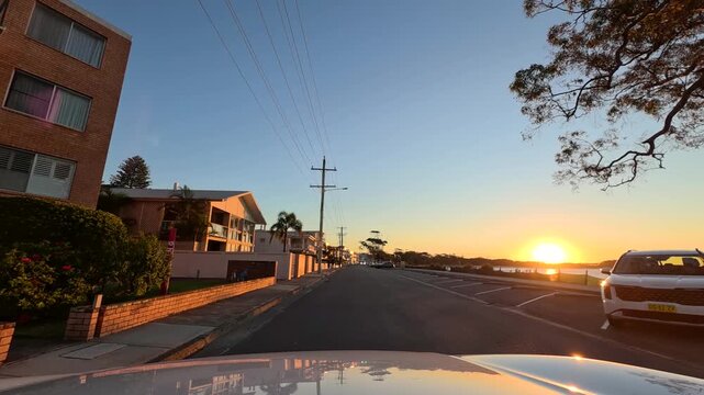 Driving Along Coastal Road at Sunset in Nelson Bay