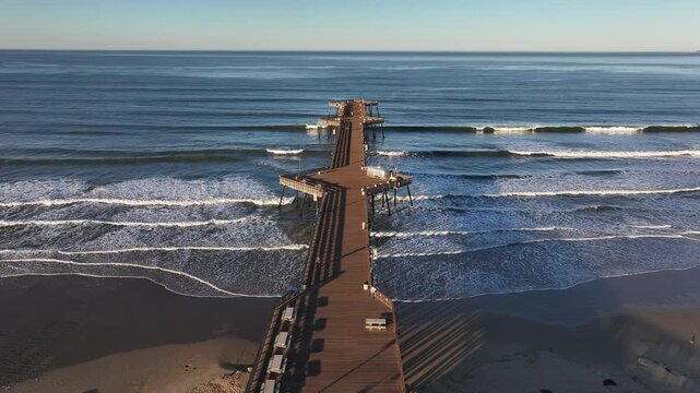 Aerial view of the boardwalk along the beach in Pismo Beach, California, USA.