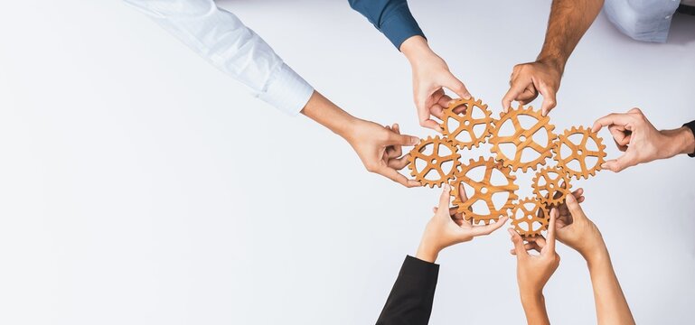 Business Team Connecting Wooden Gears for Teamwork, Collaboration, Strategy and Process Management Concept, Top View with Copy Space, JPG Photo