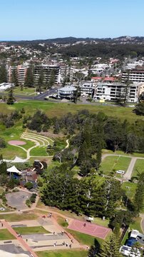 Aerial View of Coastal Town Park and Residential Buildings