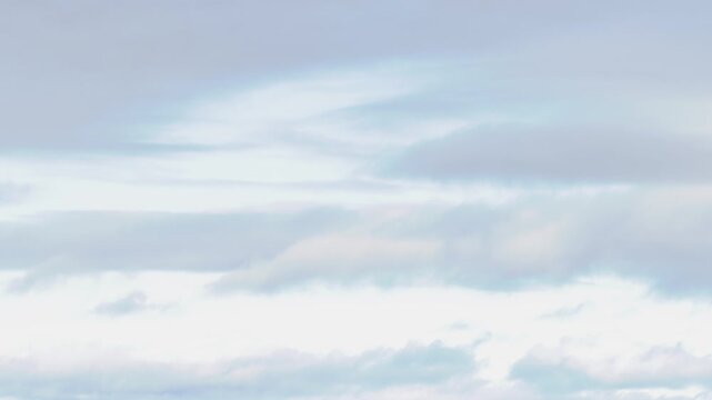Soft White and Grey Clouds Drifting Across a Bright Sky