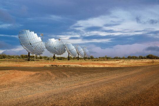 Road, car background, automotive backplate, sealed desert road with solar energy dishes to the side