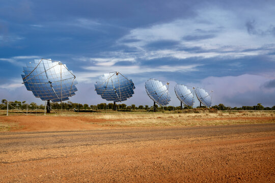 Road, car background, automotive backplate, sealed desert road with solar energy dishes to the side