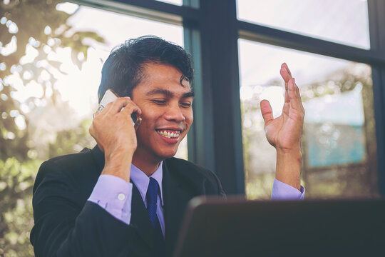 Businessmen use telephones to explain business plans and persuade business partners to invest together.. Selected focus.
