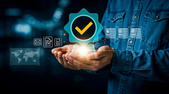 Businessman holding virtual quality assurance and compliance icon representing guaranteed service standard