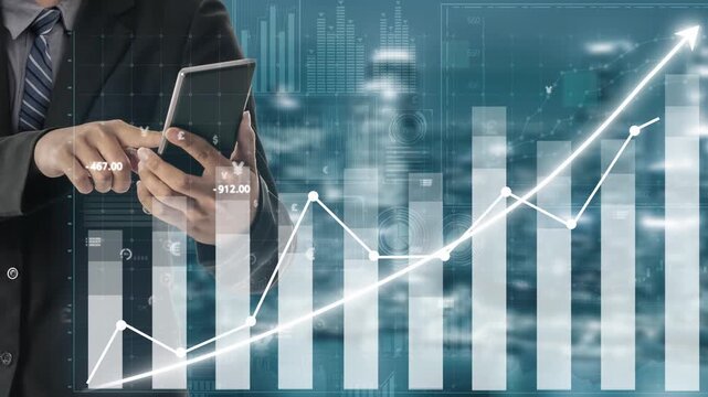 A business professional analyzes financial data on a tablet, showcasing increasing trends with graphs and currency symbols in a modern office setting. Copula