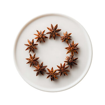 Star anise pods arranged in a circle on modern plate