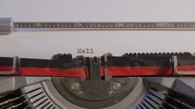 Typewriter types Hello World, perfect for coding or tech themed content