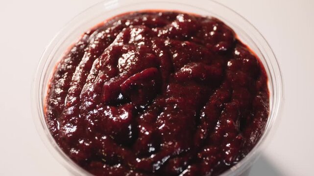 Close up cooking footage showing chamoy mix spinning on lazy susan during a homemade chamoy sauce recipe prepared from scratch