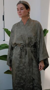 Close up of elegant woman wearing luxury kimono robe.