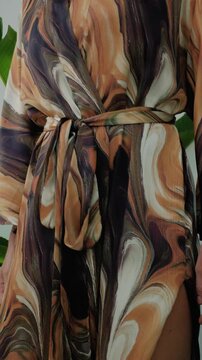 Close up of elegant woman wearing luxury kimono robe.