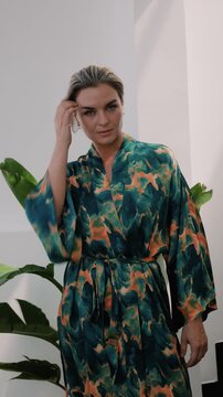 Close up of elegant woman wearing luxury kimono robe.