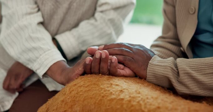 Senior, couple and holding hands in house with comfort, bonding together and support for retirement. Care, pensioner and people in home with romantic relationship, love and console with affection.