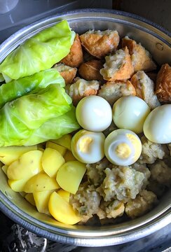 Indonesian Siomay Steamed Dumpling with Quail Egg Potato Cabbage and Tofu in Metal Tray