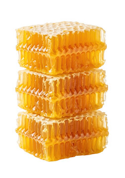 Three stacked squares of fresh golden honeycomb with sweet natural honey dripping down isolated on transparent background