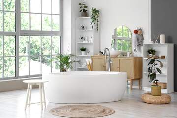 Fototapeta premium Stylish interior of modern bathroom with houseplants