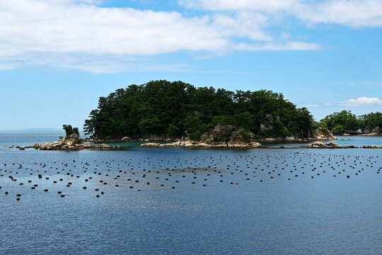 Scenic view of a Japanese pearl farm and island