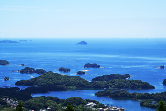 Lush green islands scattered in a blue ocean, Sasebo, Japan