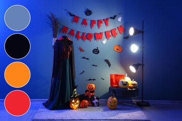 Obraz premium Halloween party decorations with pumpkins and costume