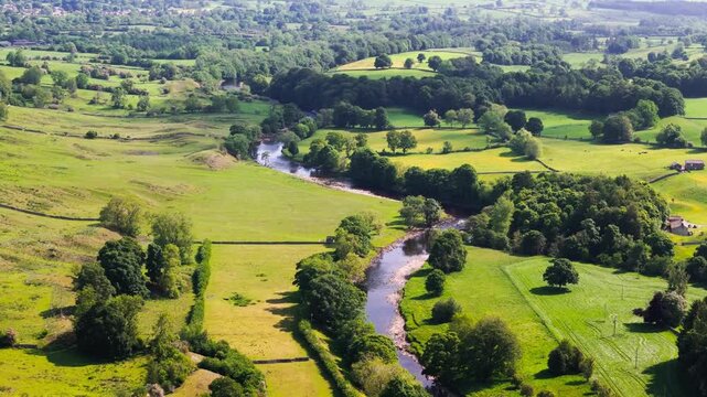 Aerial drone view flying over the river Ure of Aysgarth in the Yorkshire Dales