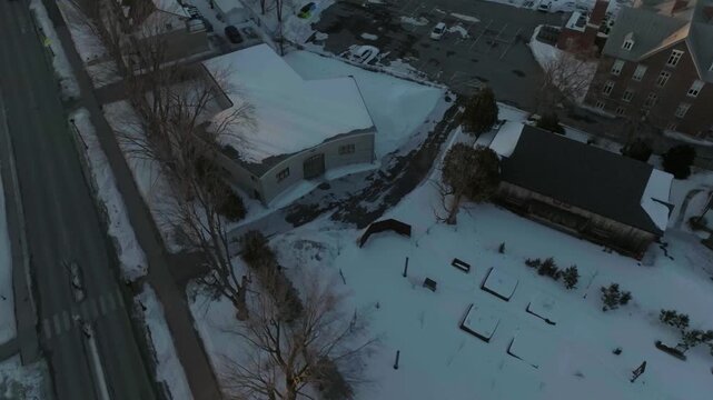 drone flying around one of the historic buildings in chambly quebec canada in winter sunny day the main garden n the old building
