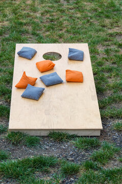 Children's game for the yard and garden on a wooden garden board.