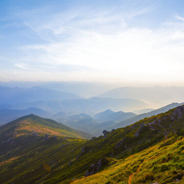 summer green mountain valley at the sunrise, early morning mountain travel scene