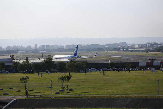 An ANA Boeing 767 Taxis at Songshan Airport.