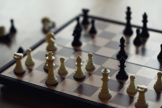Hand playing game of chess, competition, strategy, battle, play