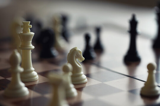 Hand playing game of chess, competition, strategy, battle, play