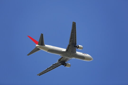 A JAL Boeing 767-346ER Flies Overhead.