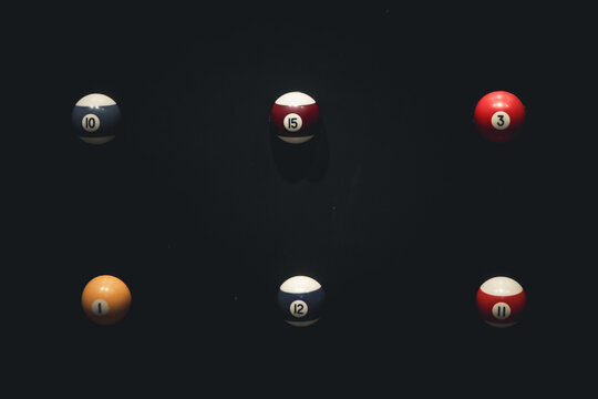 Six Pool Balls Against Darkness