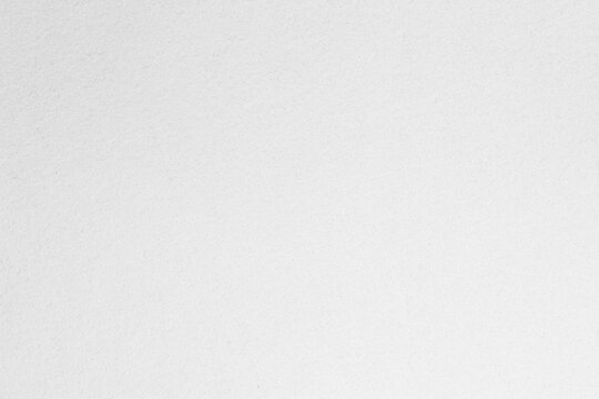 Vintage craft paper texture: Grunge vignette of old Newspaper. Abstract art background design with copy space for text. White smooth paper texture pattern, Torn page sheet with recycled material.