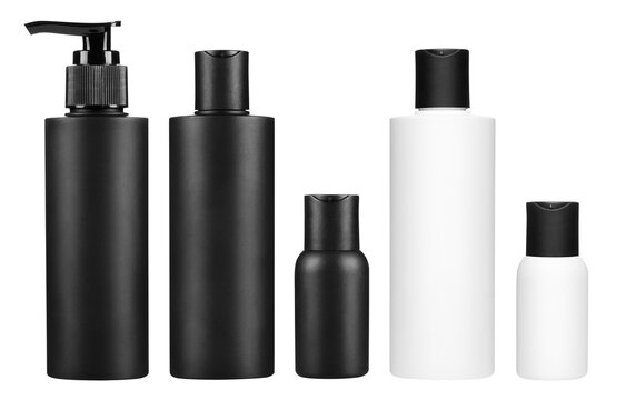 Set of cosmetic bottles with pump and flip top caps, isolated on transparent cutout background