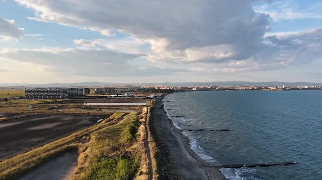 Aerial Ascension Shot over Pomorie Salt Lake, Beach Strip and Black Sea Coast