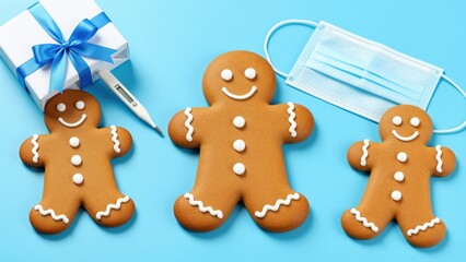 Fototapeta premium Gingerbread Cookies with a Face, Mask, and Thermometer