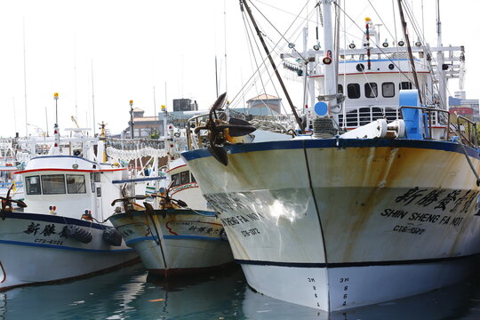 Large Squid Fishing Boats Crowd a Taiwanese Harbor.