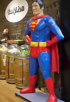Superman statue standing inside Candy Lisa candy shop
