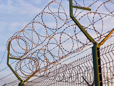 Barbed wire fence, Budapest Ferenc Liszt International Airport, Hungary, Europe