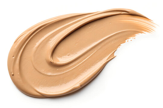 Liquid foundation makeup smear showing a creamy beige texture isolated on a clean white studio background captured with sharp focus and professional bright lighting setup