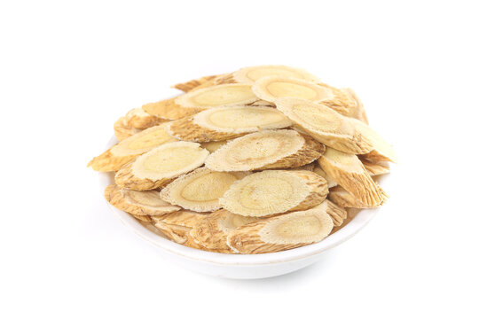 Dried Astragalus Root Slices Chinese Herbal Medicine from Gansu Province Studio Shot