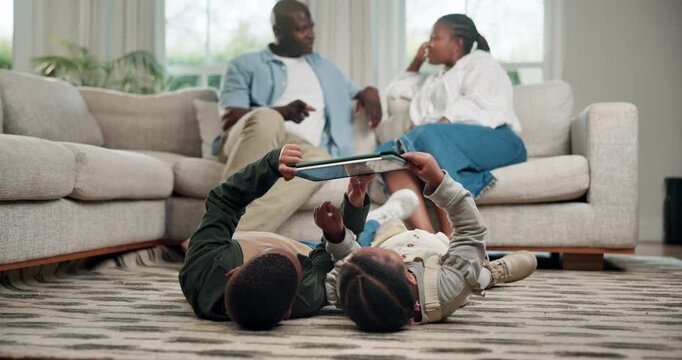 Children, siblings and play in home with tablet, bonding or knowledge game with parents supervision. African kids, boy and girl in family house with tech, typing or online educational gaming together