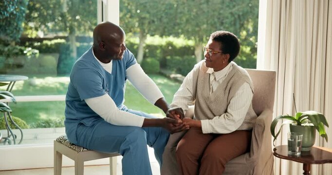 Senior care, nurse and holding hands with old woman in nursing home, support or talking with patient. Assisted living, caregiver and happy with elderly black person, chat and empathy for pensioner