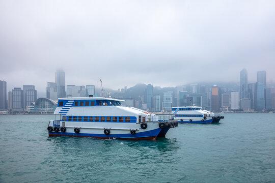 Passenger Ferries and the Hong Kong Waterfront in Fog