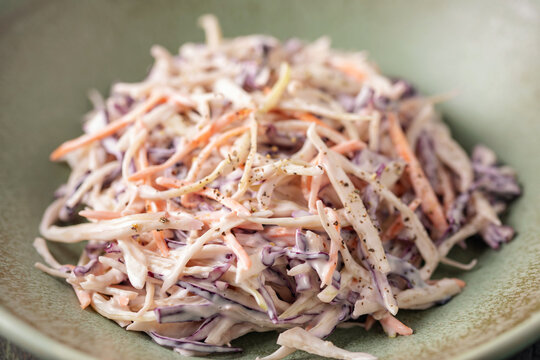 Homemade coleslaw salad in bowl on the table