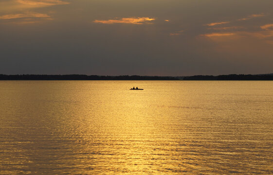 Golden sunset over the lake Sniardwy in Nowe Guty, Masuria, Poland