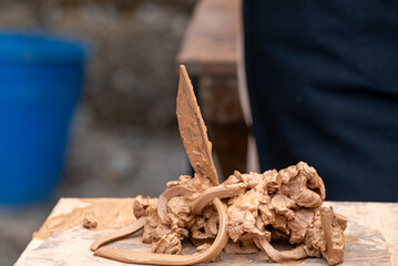 Galicia pottery workshop wet raw clay with wooden tool The Concept of artistic creation © VicVaz
