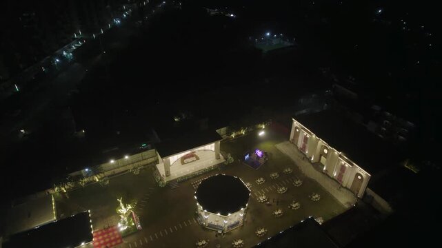 Aerial View of an Illuminated Outdoor Event Venue at Night