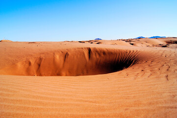 Beautiful sandy desert in the blue sky © reza